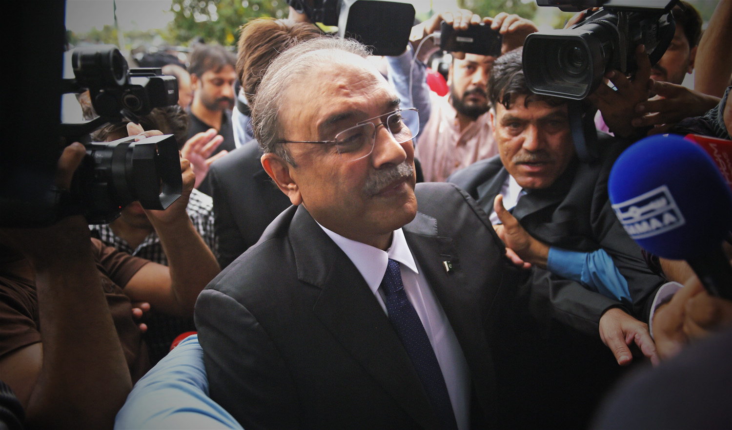 Speaking to the media following the submission of the application, PTI leader Khurram Sherzaman said that Zardari had violated the law — as a member of the National Assembly (NA) — by not declaring his full assets. (AFP/File)