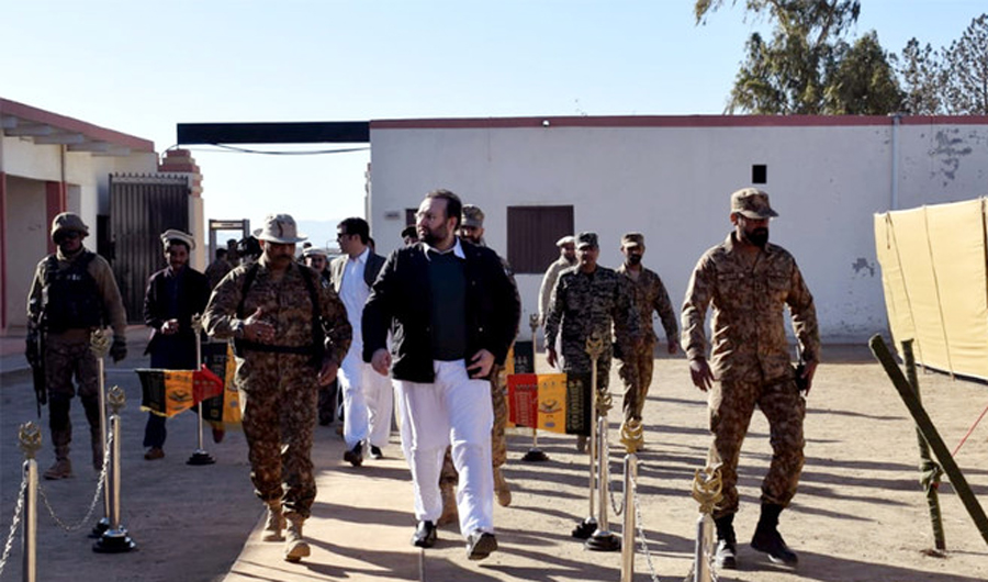 In this file photo, Khyber Pakhtunkhwa (KP) Health Minister Hisham Inamullah along with security officials at Miran Shah, the headquarters of North Waziristan tribal district, December 2018 (Photo : PTI media wing)