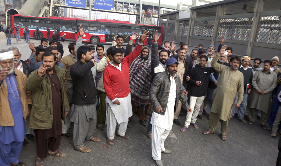 Relatives and local residents shout slogans to protest the alleged killing of a family by counter-terrorism officers in Lahore, Pakistan, Sunday, Jan. 20, 2019. Authorities in Pakistan have arrested counter-terrorism police officers after they killed a middle-aged couple, their 13-year-old daughter and another man in what the police initially claimed was a shootout with insurgents. (AP)