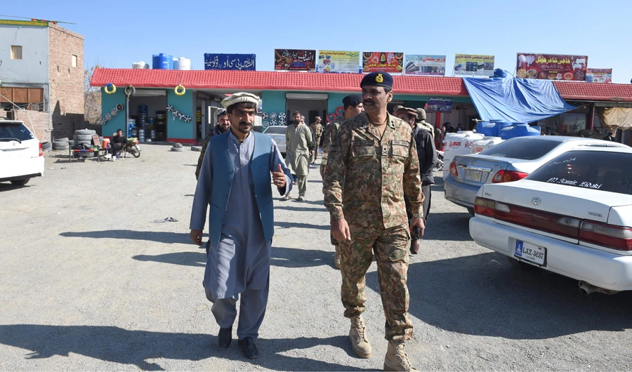 Pakistan army spokesperson Major General Asif Ghafoor visits a market in Miran Shah, a town in North Waziristan, near the border between Pakistan and Afghanistan on Sunday. (AFP)