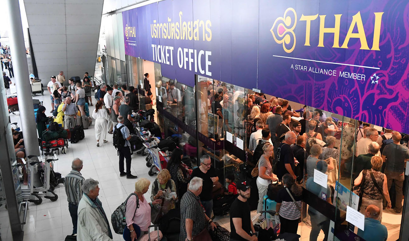 Passengers stranded at Suvarnabhumi International Airport in Bangkok on February 28, after Thai Airways canceled 11 European-bound flights; Pakistan closed its airspace as tensions with India mounted the carrier said February 28, a move affecting thousands of passengers at the height of the country’s busy tourist season. (AFP)