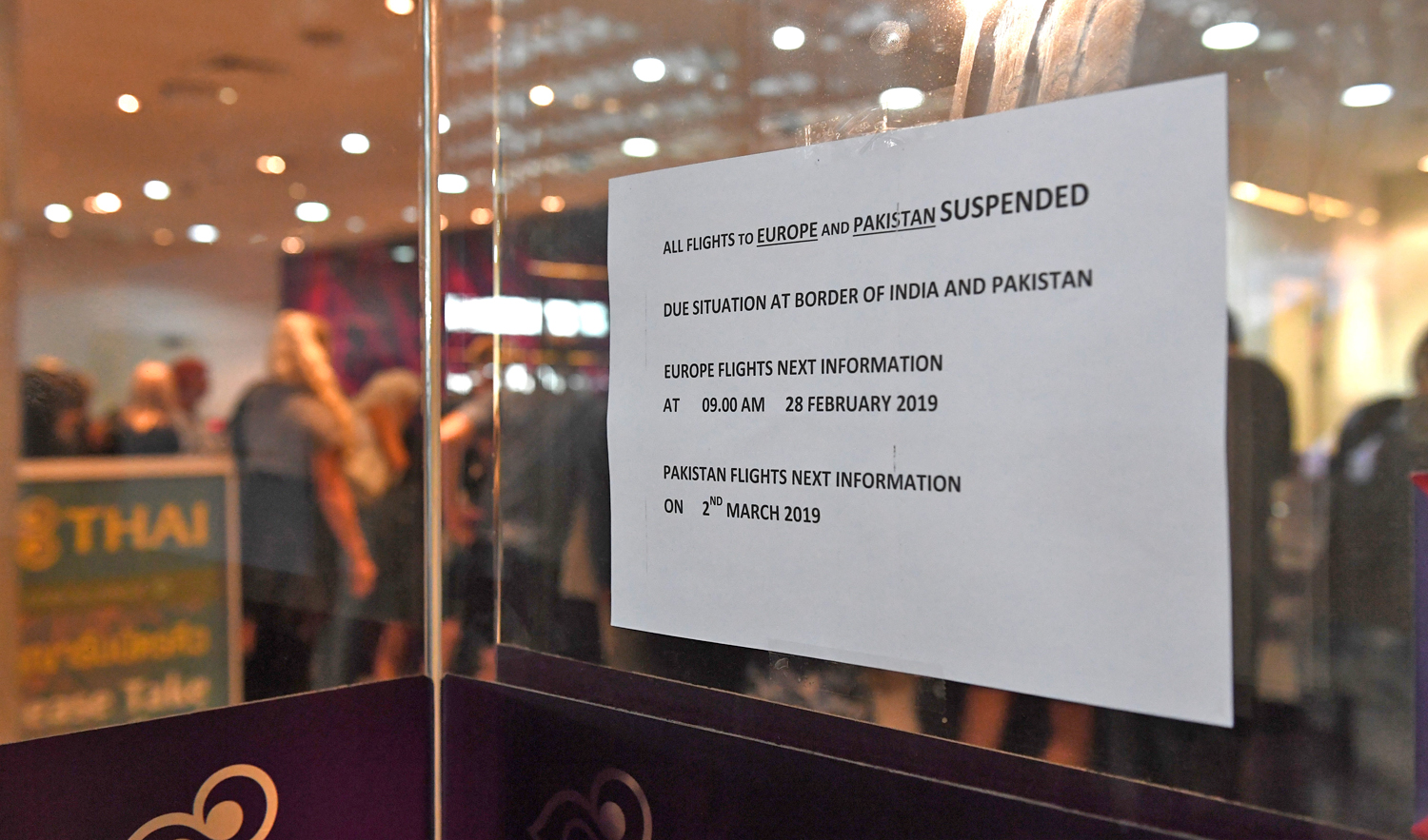 In this file photo, announcement of flight cancelations is posted at the Thai Airways ticket counter in Suvarnabhumi International Airport in Bangkok on Feb. 28, 2019. (AFP)