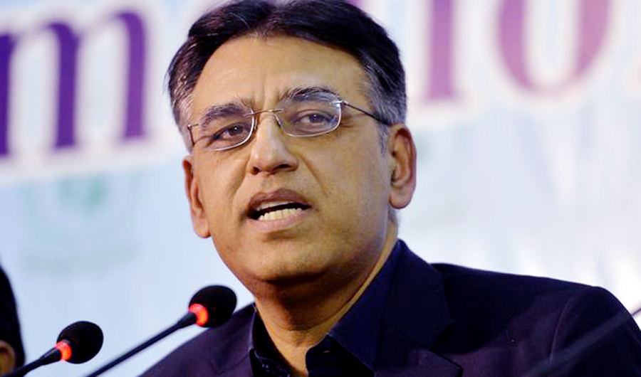 In this file photo, Finance Minister Asad Umar can be seen holding a news conference in Islamabad. Umar wrote a letter to the Financial Action Task Force's president last week, saying Islamabad firmly believed that “India’s involvement in the ICRG (International Cooperation Review Group) process will not be fair towards Pakistan” and demanded a re-composition of the group. (AFP)