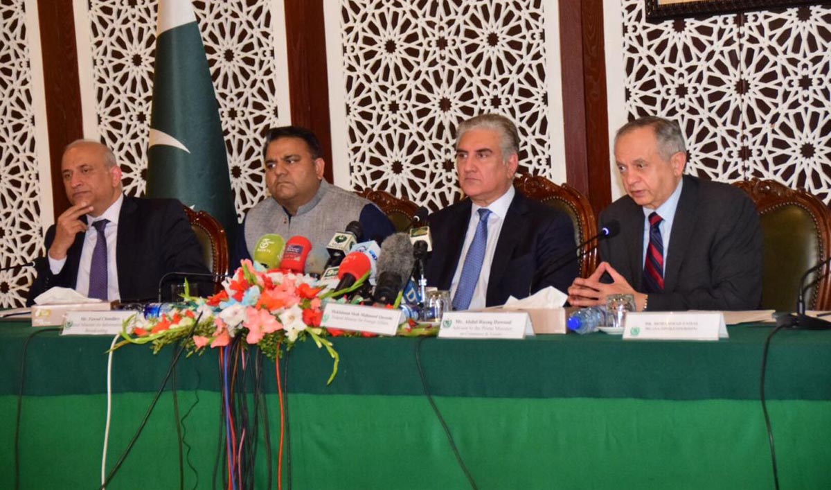 Photo caption: Foreign Minister Shah Mahmood Qureshi addresses a media briefing in Islamabad on Thursday along with Advisor to Prime Minister on Commerce Abdul Razzak Dawood, Information Minister Fawad Chaudhry and Haroon Sharif, Chairman Board of Investment. (Photo courtesy: Foreign Office)