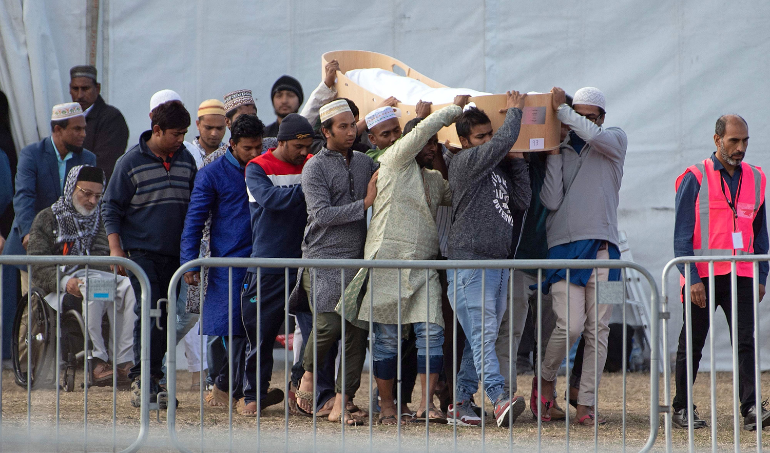 Thousands of New Zealanders gathered in Christchurch on March 22 to honor the 50 Muslim worshippers killed one week ago by a white supremacist, with a call to prayer broadcast around the country and a two-minute silence. (AFP)