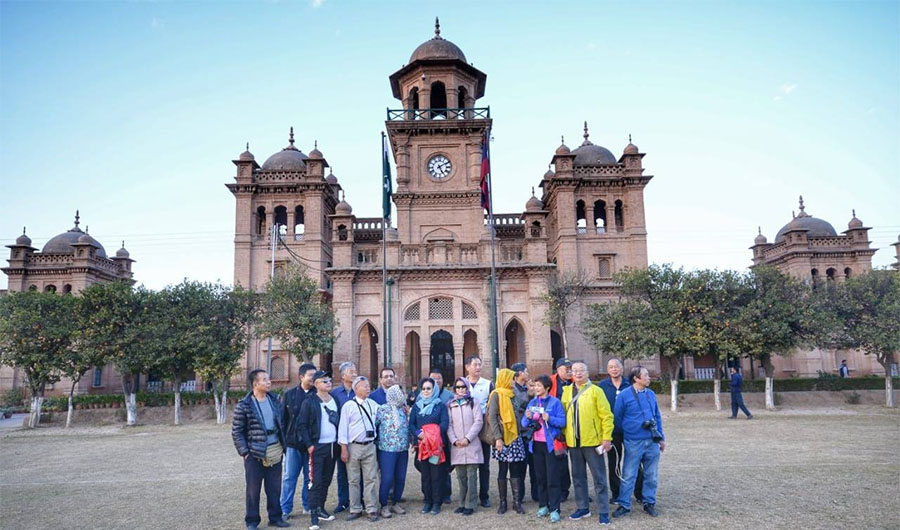 In this file photo, foreigners can be seen gathered outside the Islamia college in Peshawar. (Photo Courtesy – Tourism Cooperation Khyber Pakhtunkhwa)