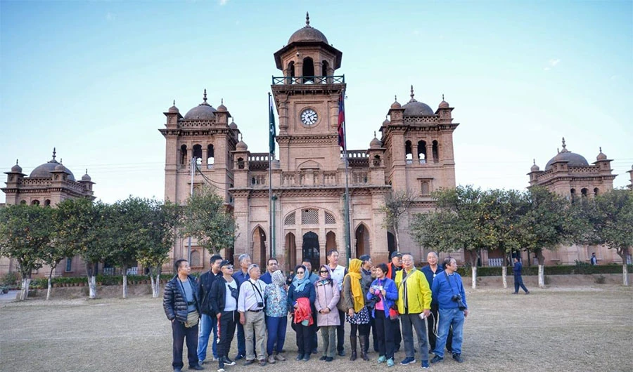 In this file photo, foreigners can be seen gathered outside the Islamia college in Peshawar. (Photo Courtesy – Tourism Cooperation Khyber Pakhtunkhwa)