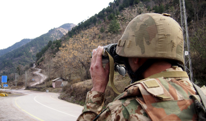A Pakistani soldier watches other side of the Line of Control (LoC) from a post in Chakoti sectort, 50 kilometers from Muzaffarabad, the capital of Pakistan-administered Kashmir, Feb 23, 2019. (AP/File)