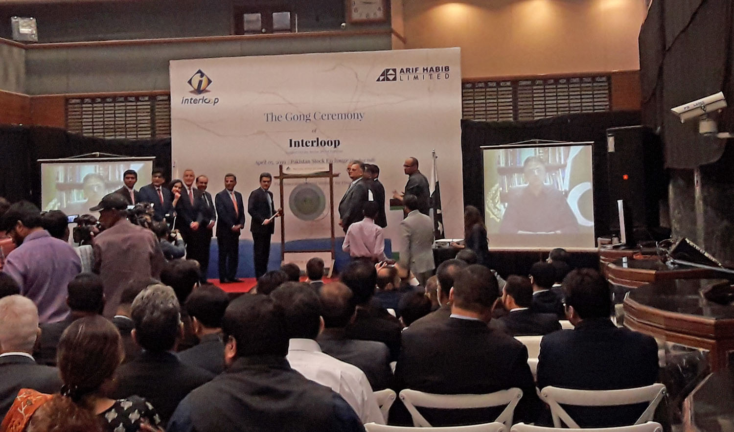 Finance Minister Asad Umar addressing the audience via video message at the gong ceremony held at the PSX on Friday. (AN photo)