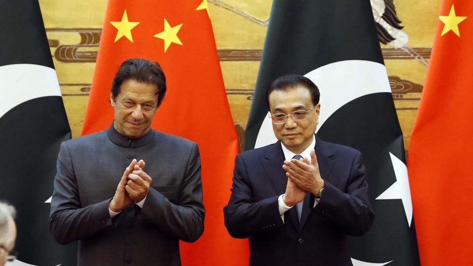 In this file photo, Pakistani Prime Minister Imran Khan and China's Premier Li Keqiang attend a signing ceremony at the Great Hall of the People in Beijing on November 3, 2018(AP / file)