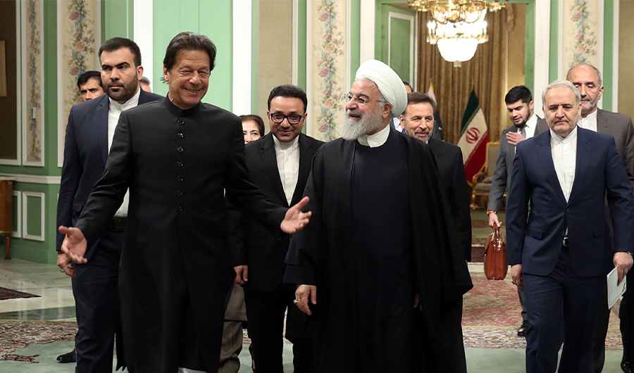 A handout picture provided by the Iranian presidency on April 22, 2019 shows Iranian President Hassan Rouhani (R) meeting with Pakistani Prime Minister Imran Khan in the Iranian capital Tehran. (AFP / Iranian Presidency)