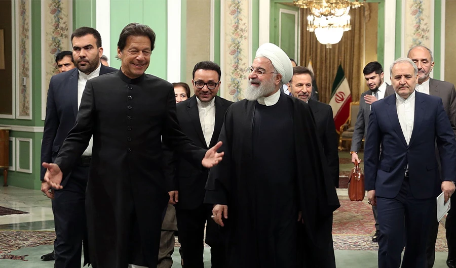 A handout picture provided by the Iranian presidency on April 22, 2019 shows Iranian President Hassan Rouhani (R) meeting with Pakistani Prime Minister Imran Khan in the Iranian capital Tehran. (AFP / Iranian Presidency)