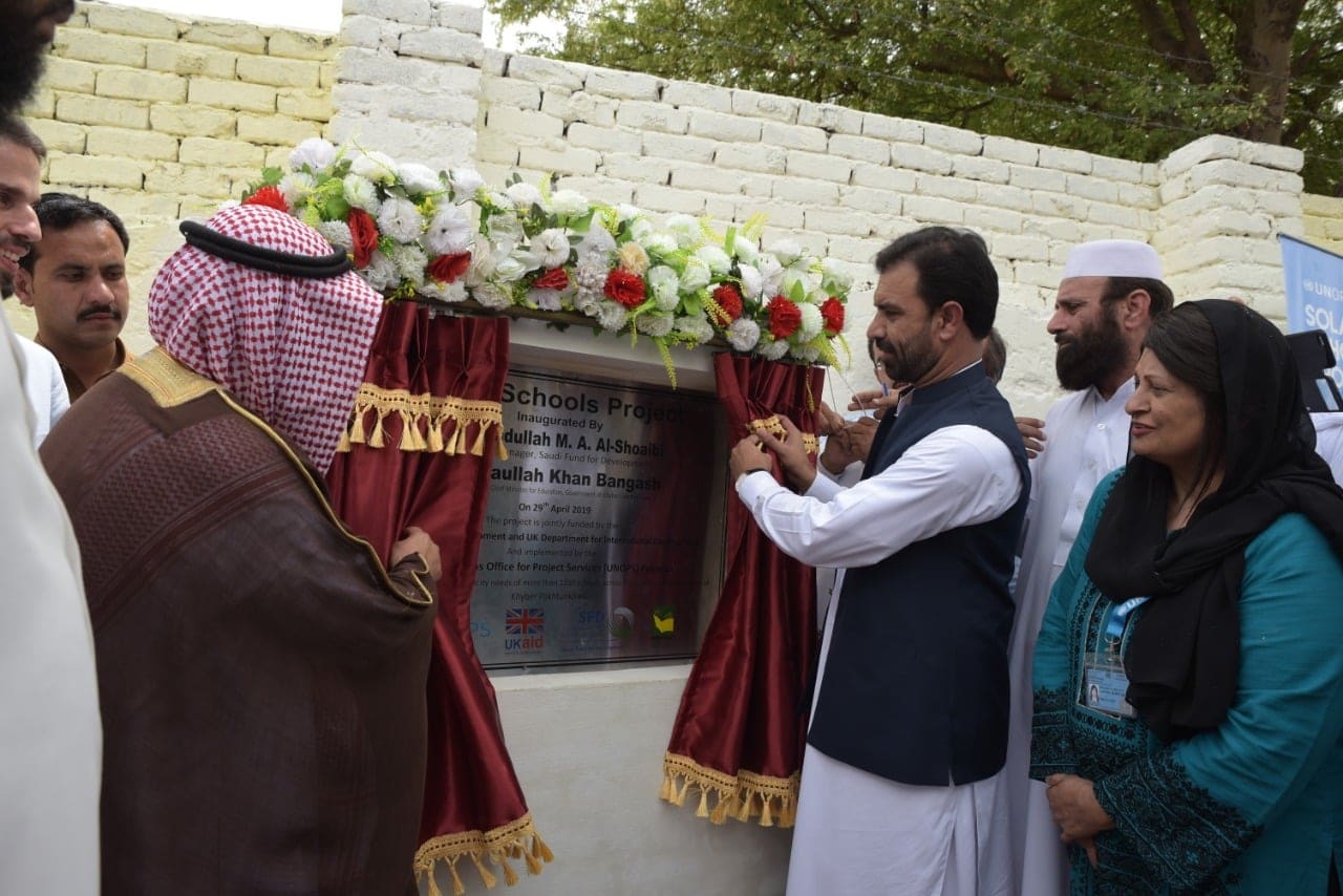 Advisor to KP Chief Minister on Education Ziaullah Bangash (right) and Eng. Abdullah Al Shoaibi, regional manager for Saudi Fund for Development (SFD), inaugurate installation of solar PV systems in Khyber Pakhtunkhwa (KP) province. (Photo courtesy: KP education directorate)