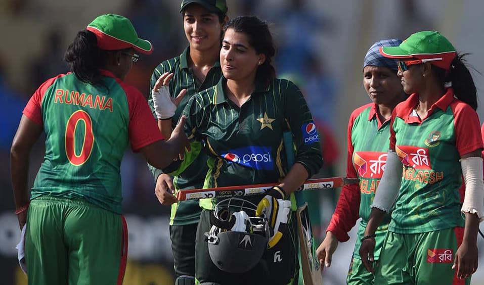 In this October 6, 2015 file photo, Pakistan's former captain Sana Mir (C) shakes hands with Bangladesh's Rumana Ahmed after winning the series. (AFP)