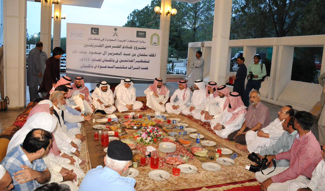 In this May 17, 2019 file photo, Ambassador Nawaf Saeed Al-Malki hosts an Iftar dinner to launch annual Ramadan meals program at Faisal Mosque in the Pakistani capital Islamabad. (Saudi Embassy/Twitter)