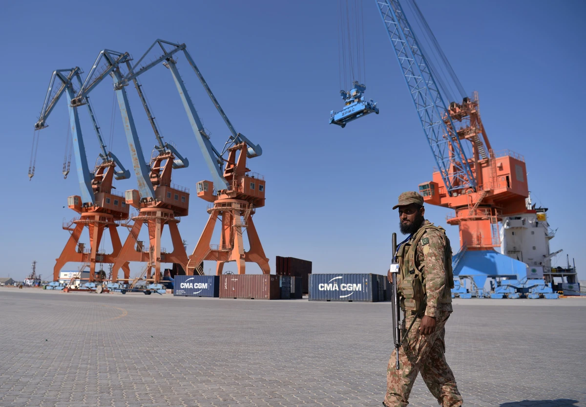 In this file photo taken on November 13, 2016, a Pakistani Army personnel looks on during the opening of a trade project in Gwadar port, some 700 kms west of Karachi. Gunmen have stormed a five-star hotel in the southwestern Pakistani port city of Gwadar, the centrepiece of a multi-billion dollar Chinese infrastructure project in the country, a provincial minister said on May 11. (AFP)