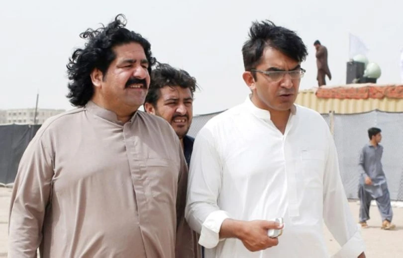 In this May 13, 2018 file photo, Ali Wazir (L) and Mohsin Dawar, leaders of the Pashtun Tahaffuz Movement (PTM), walk at the venue of a rally in Karachi, Pakistan. (Reuters)