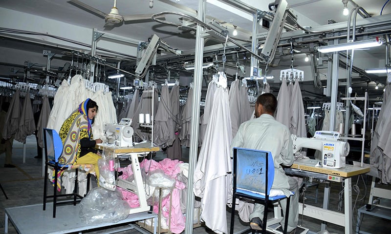 In this undated file photo, Pakistani machinists work at a textile factory in Faisalabad. Pakistani exporters warned during a media interaction in Karachi of 20-30 percent hit if zero rating sales tax regime was abolished by the government in the upcoming budget. (AFP)