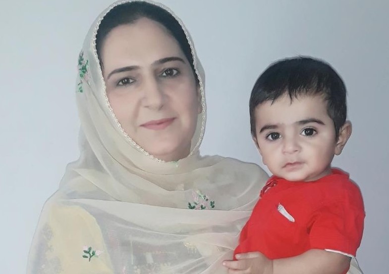 Mahjabeen Sheran, a member of the Balochistan assembly who prompted a social media outrage in April after fellow lawmakers asked her to leave the house for bringing her infant to a parliamentary session, poses for a photo with nine-month-old son Ayan Sheran at her residence in Quetta, Pakistan on June 14, 2019 (AN Photo)