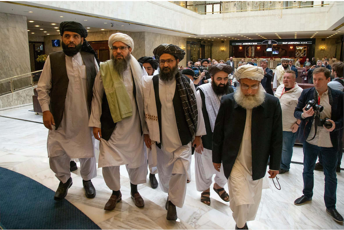 Mullah Abdul Ghani Baradar, the Taliban's deputy leader, center, arriving with other members of the group for talks in Moscow on May, 28 2019. ( AP photo)