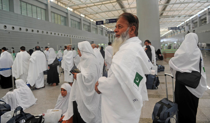Pakistani pilgrims wait to pass security in Jeddah on Monday, June 17, 2019. (AFP/File)