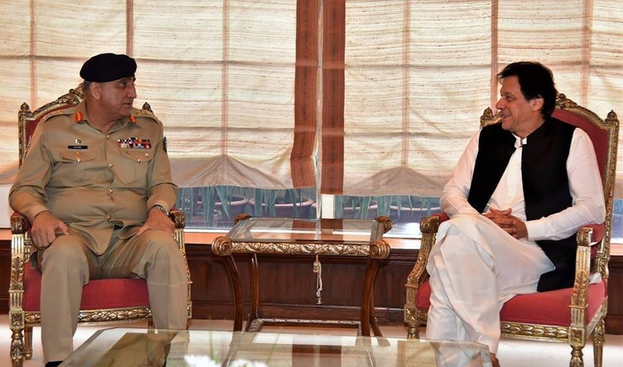Pakistani Chief of Army Staff Gen Qamar Javed Bajwa congratulates Prime Minister Imran Khan on assuming the office of prime minister during their meeting on Monday, August 27, 2018. (PID)