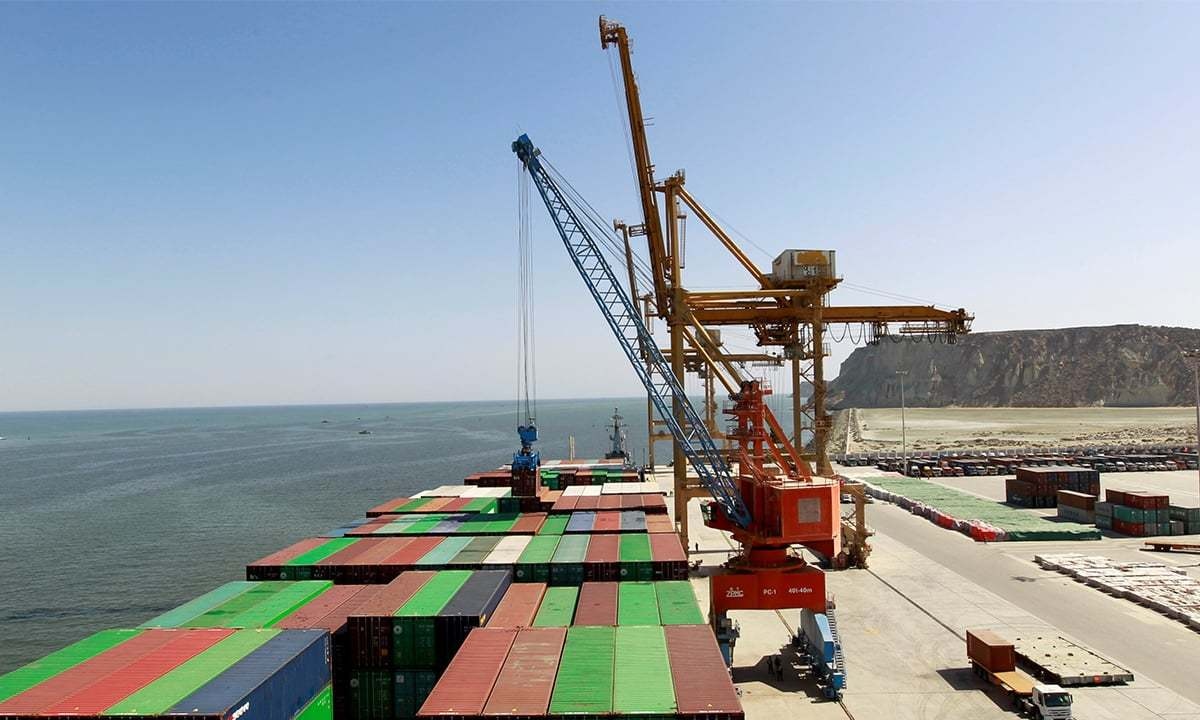 In this undated file photo, a cargo container is loaded at the Gwadar Port in Pakistan where Saudi Arabia has announced it will set up a $10 billion oil refinery. On Friday June 21, 2019, the Karachi Chamber of Commerce and Industry said a high-level Saudi delegation will arrive in Islamabad next month to explore bilateral trade opportunities. (Reuters)