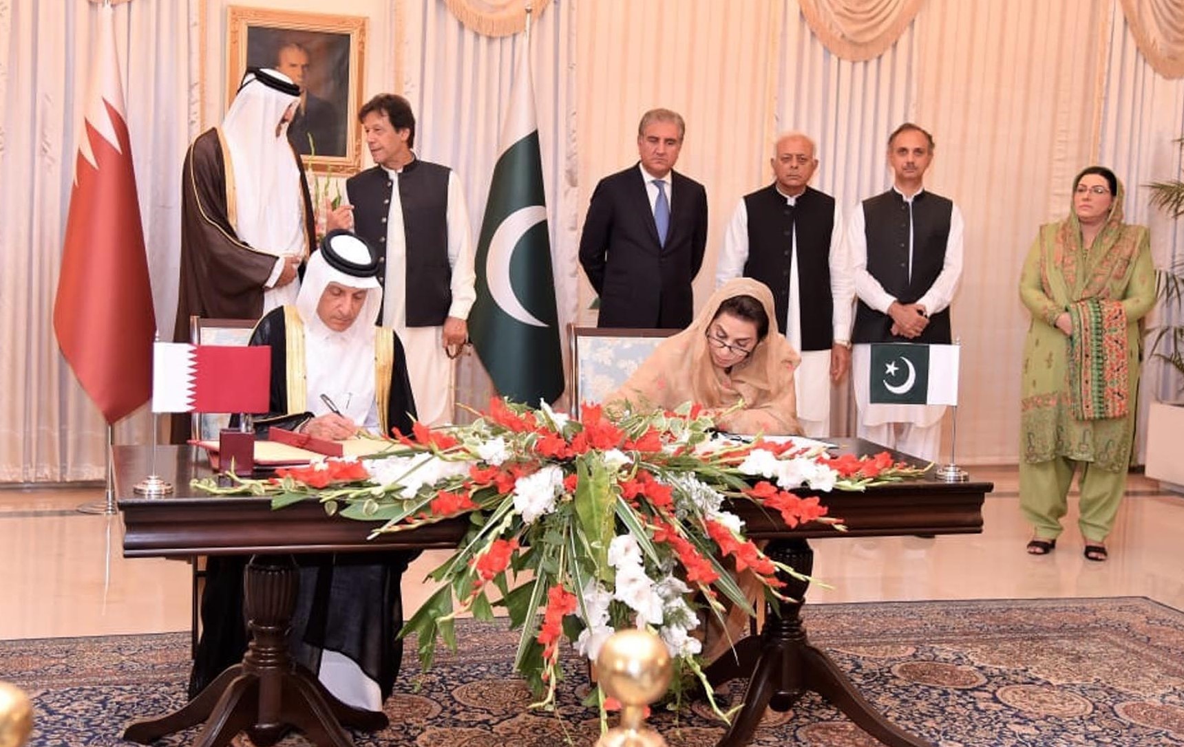 Prime Minister Imran Khan and Qatar Emir Sheikh Tamim Bin Hamad Al-Thani witness the signing of three memoranda of understanding (MoUs) in Islamabad on June 22, 2019. (PID)