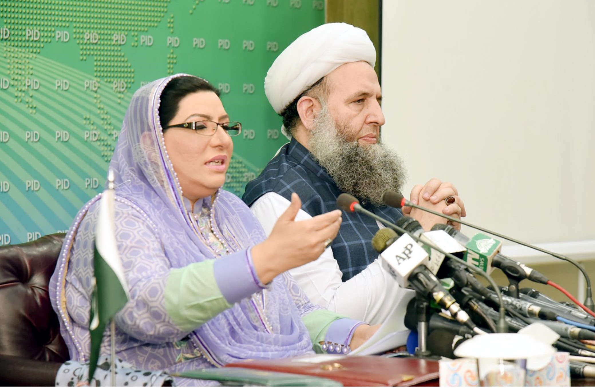 Special Assistant to Prime Minister on Information, Firdous Ashiq Awan briefing the media persons about the decisions taken in federal cabinet meeting along with Religious Affairs Minister Noor ul Haq Qadri in Islamabad on July 02, 2019. (PID)