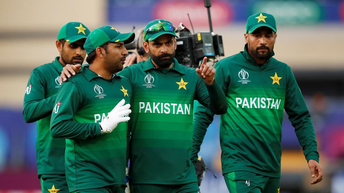 Pakistan’s Sarfaraz Ahmed and Mohammad Hafeez celebrate victory over England at Trent Bridge on June 3, 2019 (Reuters)