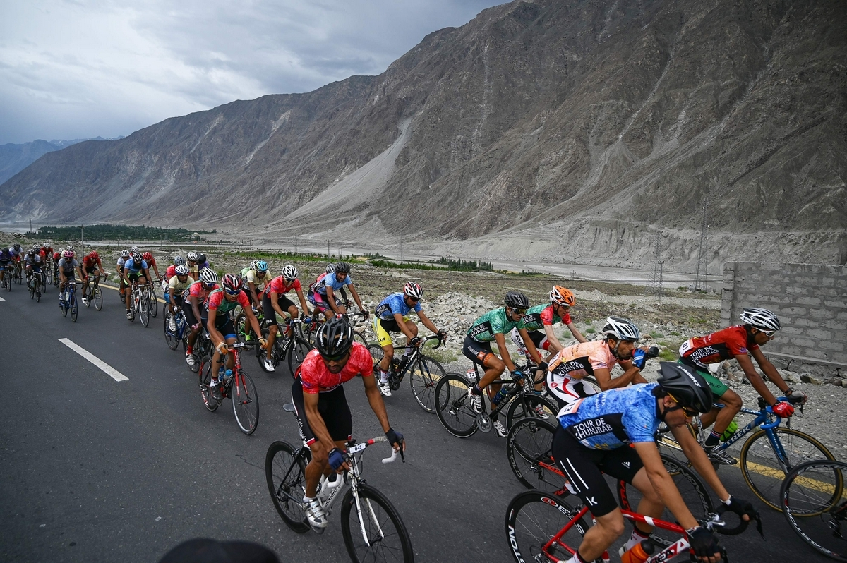 Pakistani and international cyclists take part in the Tour de Khunjerab on June 30, 2019 (AFP)