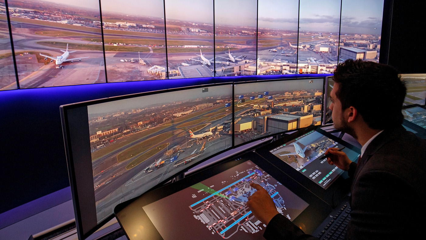 Air Traffic Control Engineers use screens displaying real-time panoramic views of the runways and docking gates inside the control tower at London Heathrow Airport in west London on Jan. 23, 2019. Pakistan’s airspace has been reopened to civil aviation with immediate effect, its aviation authority said on Tuesday. (AFP/File)