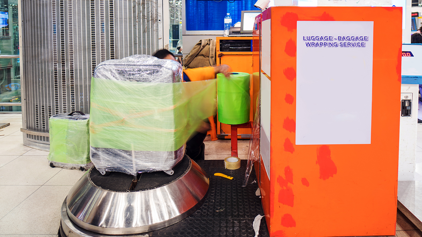 In a notification, authority said decision regarding compulsory wrapping check-in baggage at all airports “…to be treated as canceled ab initio with immediate effect.” (Shutterstock)