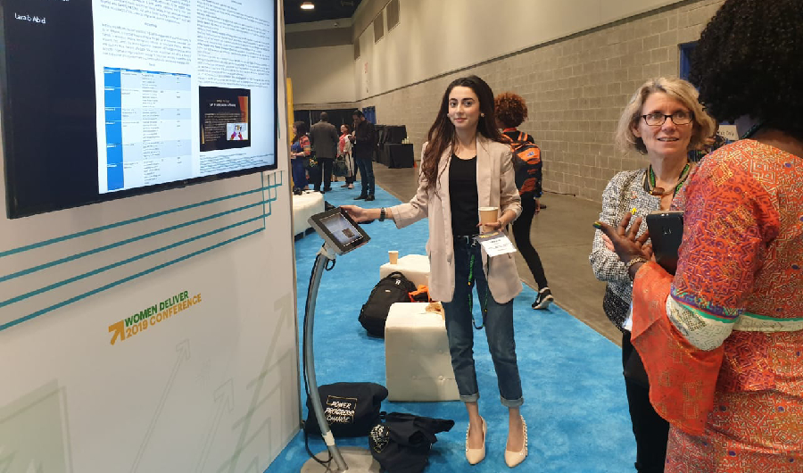 Laraib Abid presents her digital poster at the Women Deliver 2019 Conference in Vancouver, Canada, where her Bridge the Gap by Mashal mobile application on reproductive health won the Idea Award presented by the Bill and Melinda Gates Institute for Population and Reproductive Health, on June 4th, 2019 (Image courtesy Laraib Abid)
