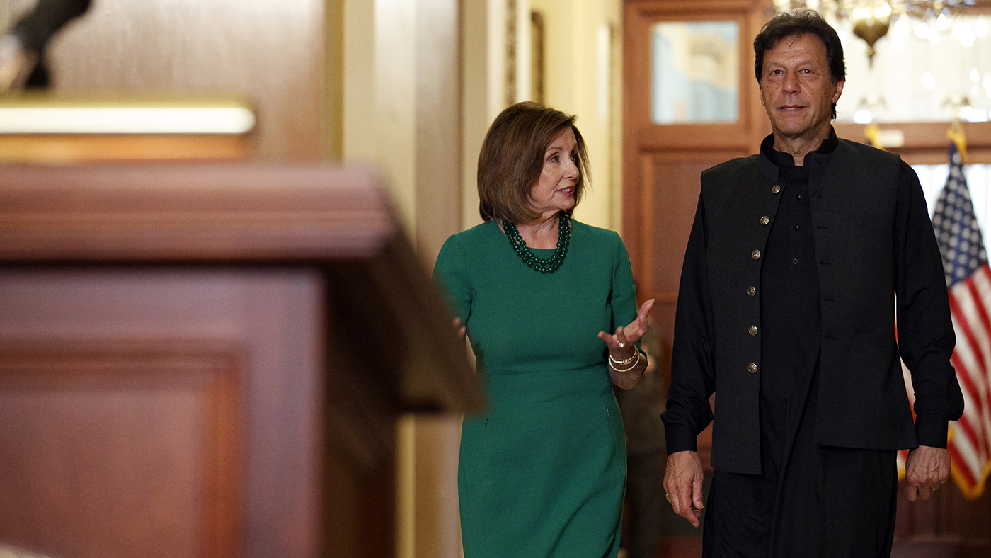 Pakistan's Prime Minister Imran Khan, right, walks with House Speaker Nancy Pelosi of Calif., to speak to the media at Capitol Hill in Washington on Tuesday, July 23, 2019. (AP)
