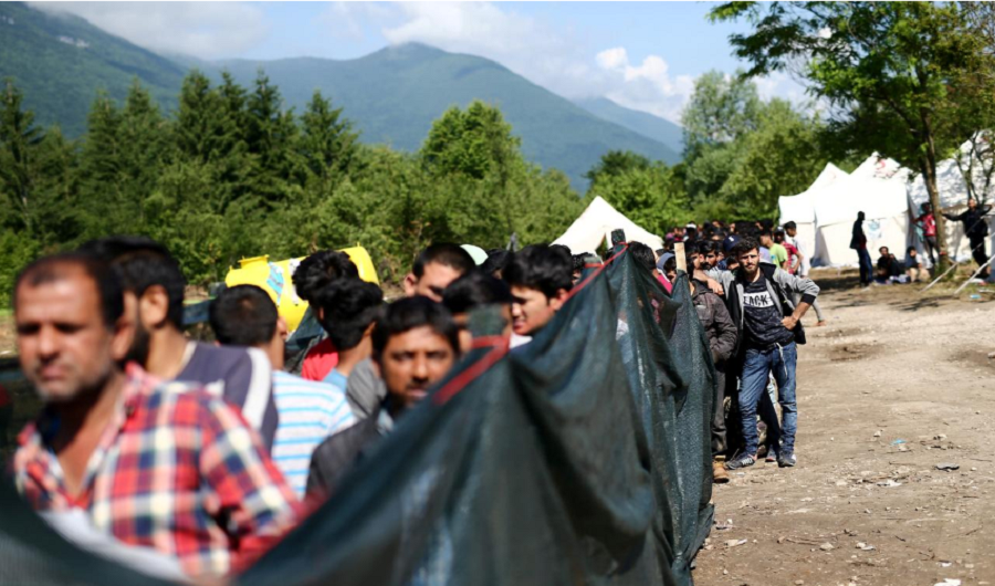 Migrants wait for food at the camp Vucjak, in Bihac area, Bosnia and Herzegovina, June 19, 2019. REUTERS