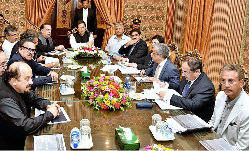 In this file photo Prime Minister Imran Khan chairs meeting on development projects funded by the Federal Government. - APP