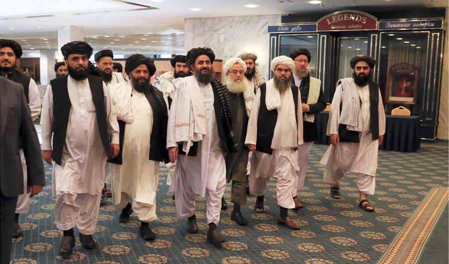 Members of a Taliban delegation, led by chief negotiator Mullah Abdul Ghani Baradar (C, front), walk before a meeting with Afghan senior politicians in Moscow, Russia May 30, 2019. REUTERS/Evgenia Novozhenina