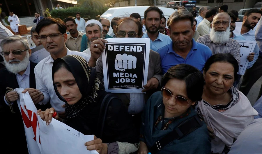 Journalists chant slogans during a rally protest which they say is against layoffs and the non-payment of salaries, in Karachi, Pakistan February 26, 2019. REUTERS