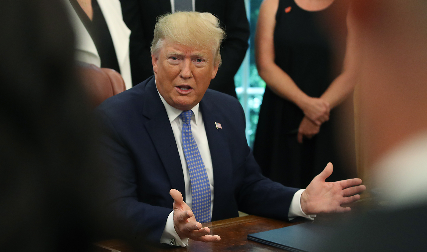 In this file photo, U.S. President Donald Trump speaks to reporters in the Oval Office at the White House in Washington, DC on June 25, 2019. (AFP)