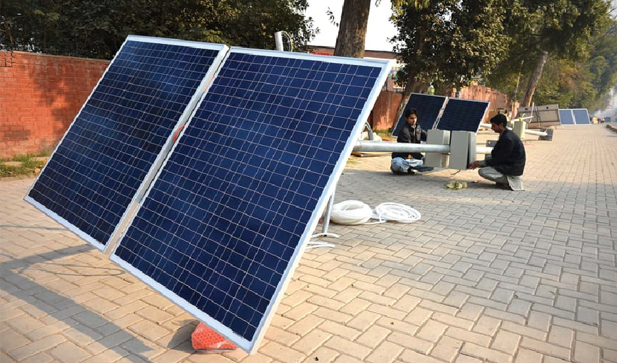 Solar streetlights being installed at Peshawar Cantt. (White Star/ File Photo)
