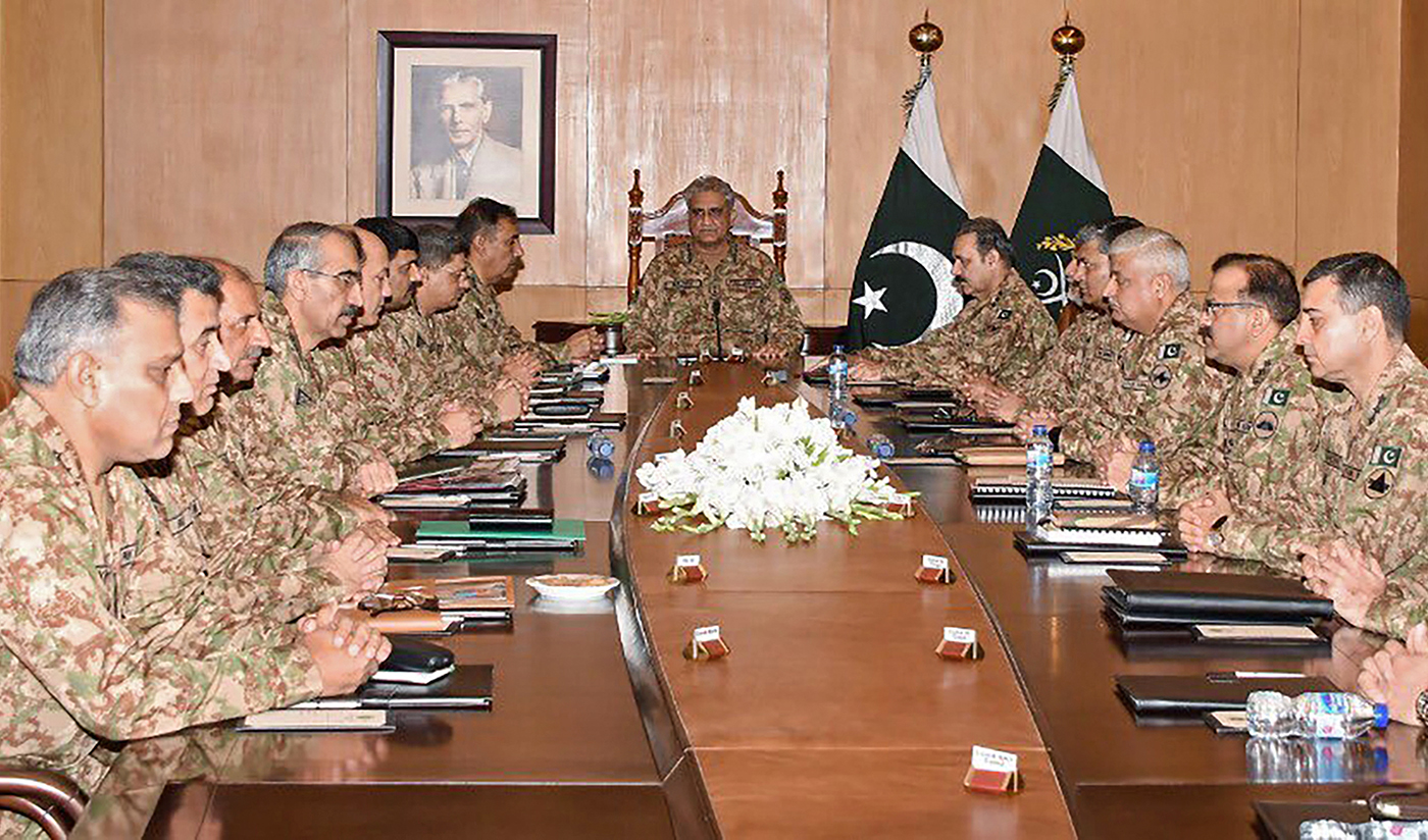 In this handout picture taken and released by Pakistani military Inter Services Public Relations (ISPR) on August 6, 2019, Army Chief General Qamar Javed Bajwa, center, presides over a Corps Commanders' Conference in Rawalpindi. (Handout/ISPR via AFP)