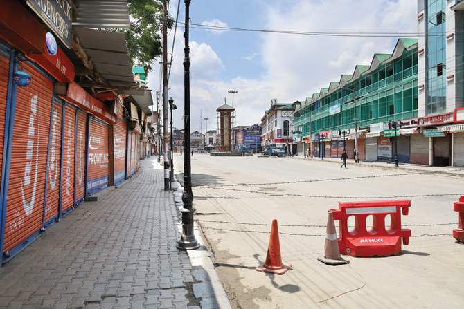 Lal Chowk, Srinagar’s business hub, wears a deserted look as the city is under unprecedented lockdown for more than a week. (AN photo by Manzoorul Hassan)