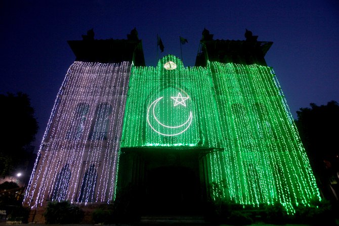 A general view of the Metropolitan building illuminated with national flag, ahead of Pakistan's Independence Day in Lahore, Pakistan, on August 13, 2019. (REUTERS/Mohsin Raza)
