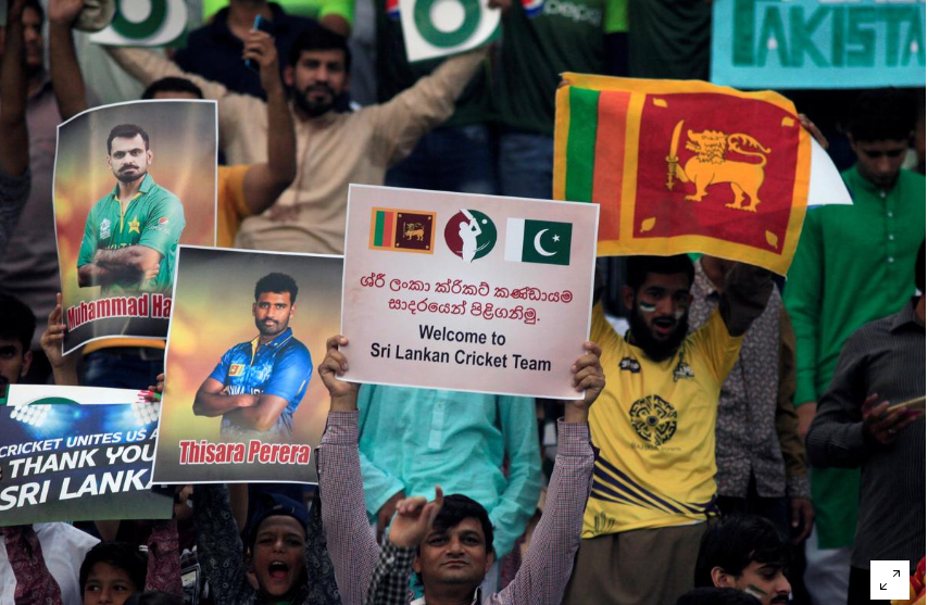 In this file Photo Spectators hold placards during the Twenty20 international cricket match between Pakistan and Sri Lanka in Lahore, Pakistan October 29, 2017. (Reuters)