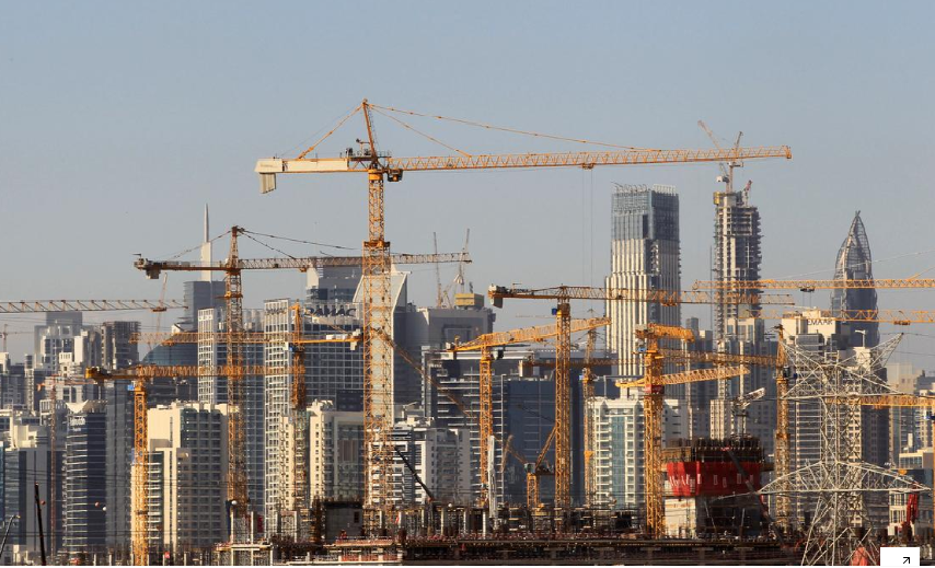 General view of Dubai's cranes at a construction site in Dubai, UAE December 18, 2018. (REUTERS)