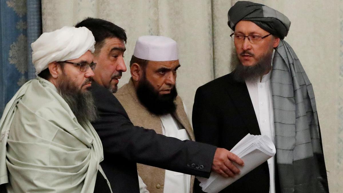 Members of a Taliban delegation take their seats during the multilateral peace talks on Afghanistan in Moscow on on November 9, 2018. Reuters