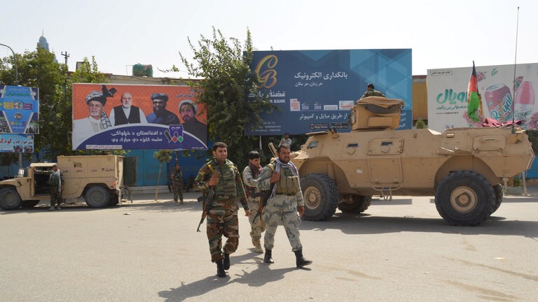 Afghan security forces patrol an area during a Taliban attack in Kunduz city, August 31, 2019 (REUTERS)