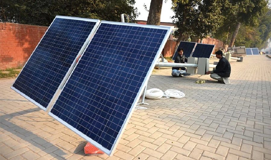 Solar streetlights being installed at Peshawar Cantt. (White Star/ File Photo)