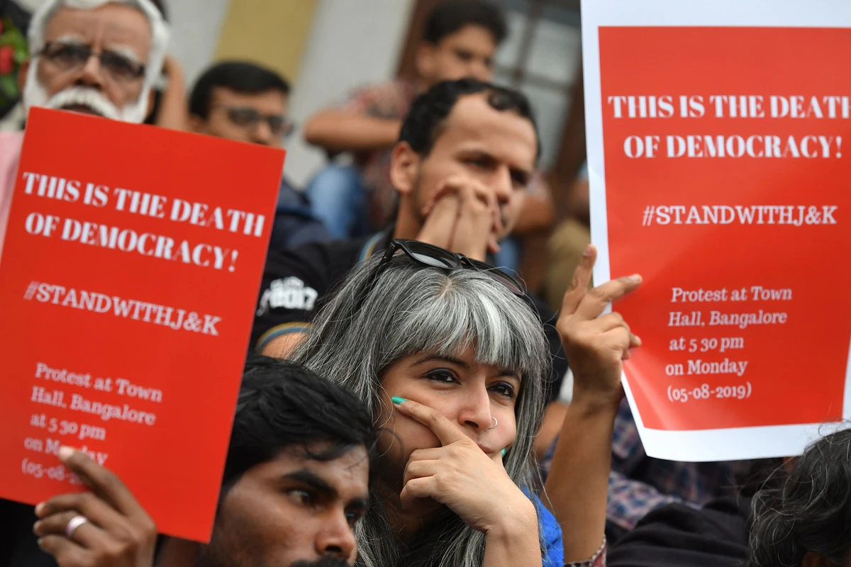 Protesters and activists belonging to the Alternative Law Forum and other left wing organizations take part in a protest in Bangalore on August 5, 2019, in reaction to the Indian government scrapping Article 370 that granted a special status to Jammu and Kashmir. The Indian government on August 5 stripped Kashmir of the special autonomy it has had for seven decades, prompting a furious response from nuclear-armed rival Pakistan and raising fears of further violence in the Muslim-majority Himalayan region. (AFP)